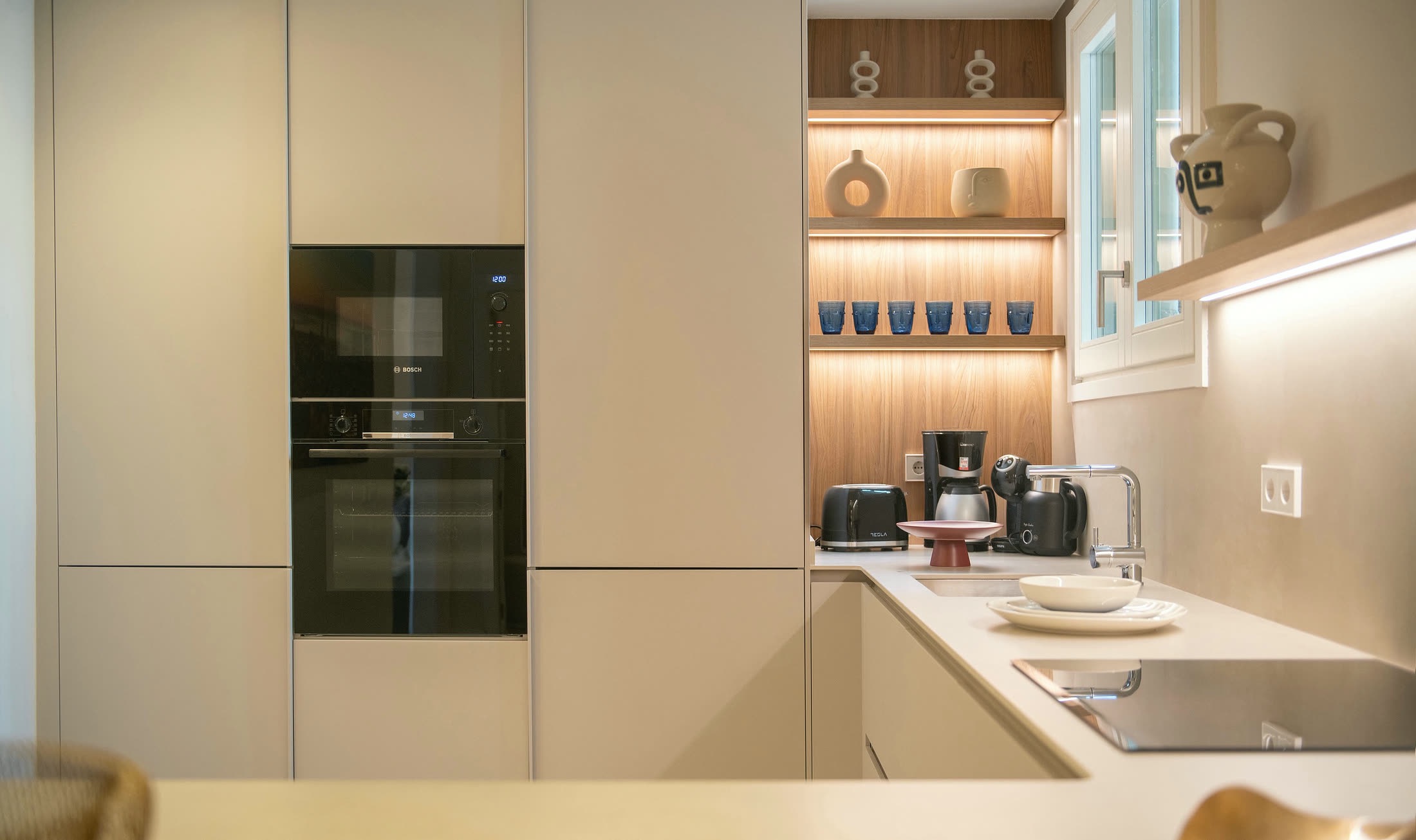 Suite Alba fitted kitchen with oven, cooktop and coffee equipment