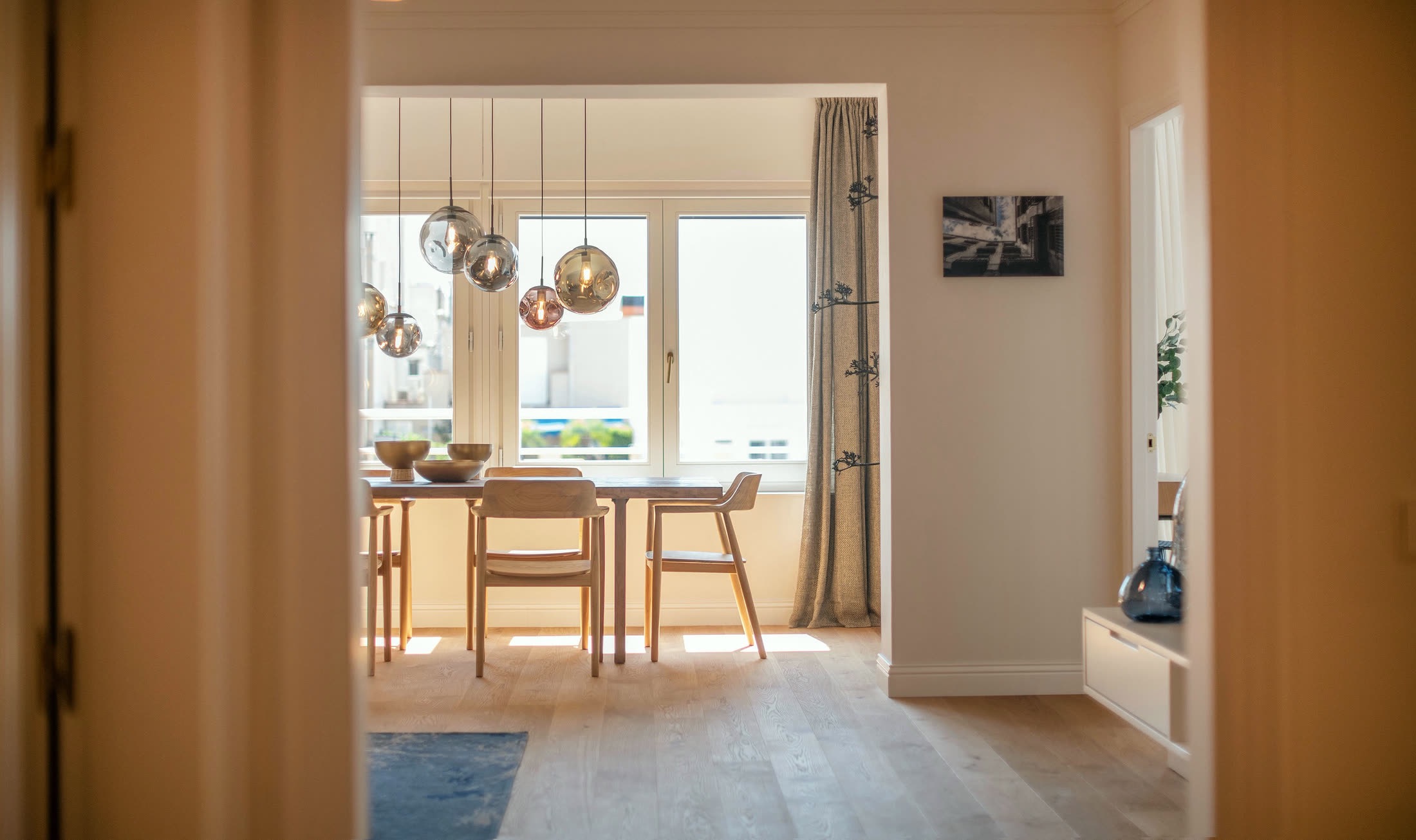 View through Suite Alba toward the sunlit dining room