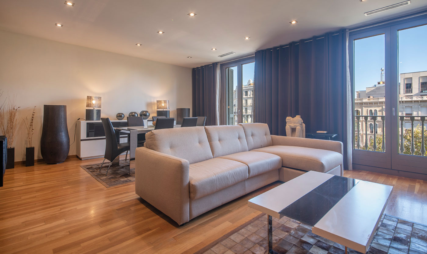 Suite Sagrada living room overlooking Passeig de Gràcia in Barcelona