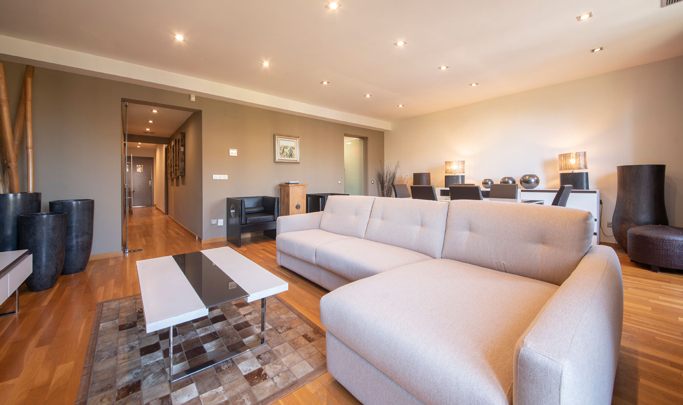 Cream sectional sofa and coffee tables in Suite Sagrada