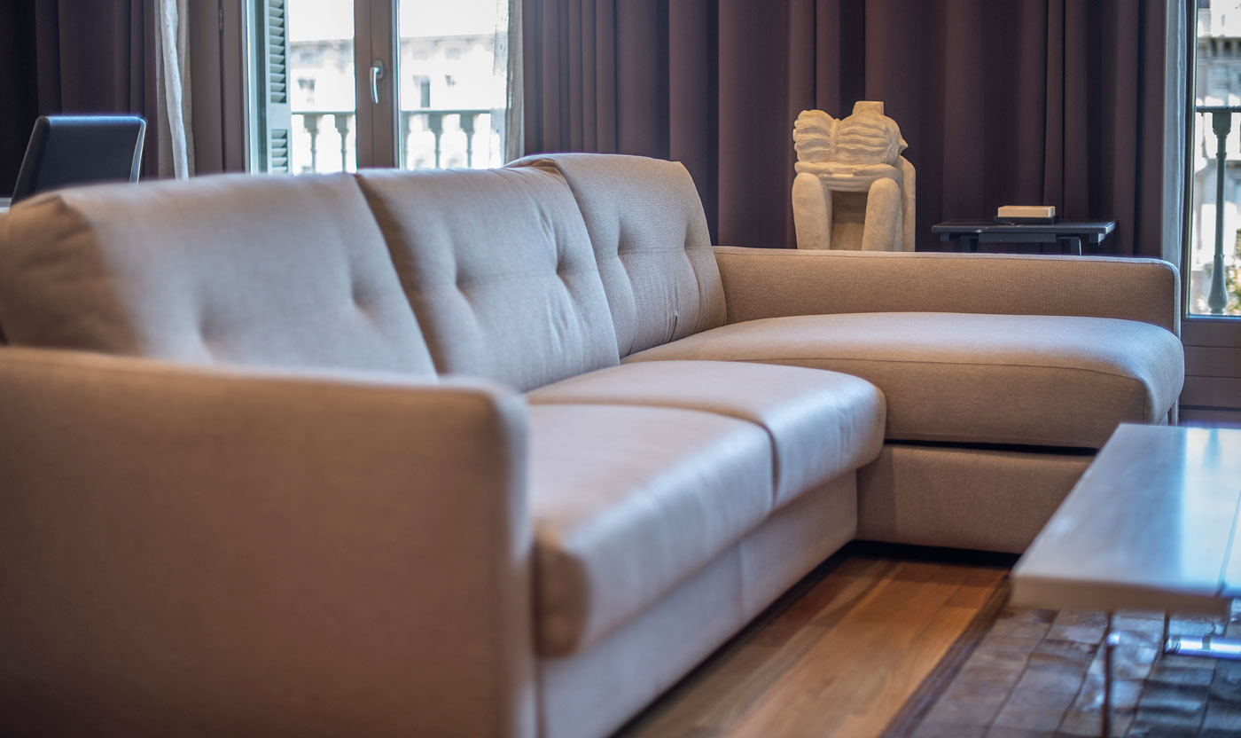 Sectional sofa beside the Suite Sagrada balcony